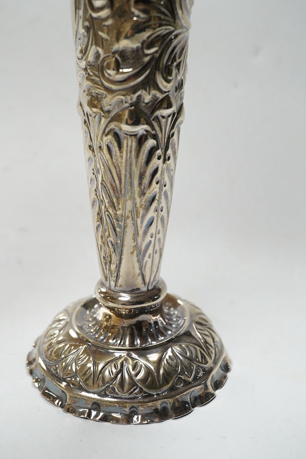 A pair of late Victorian repousse silver trumpet vase, Charles Boyton II, London, 1892/3, 20.3cm, weighted. Condition - poor